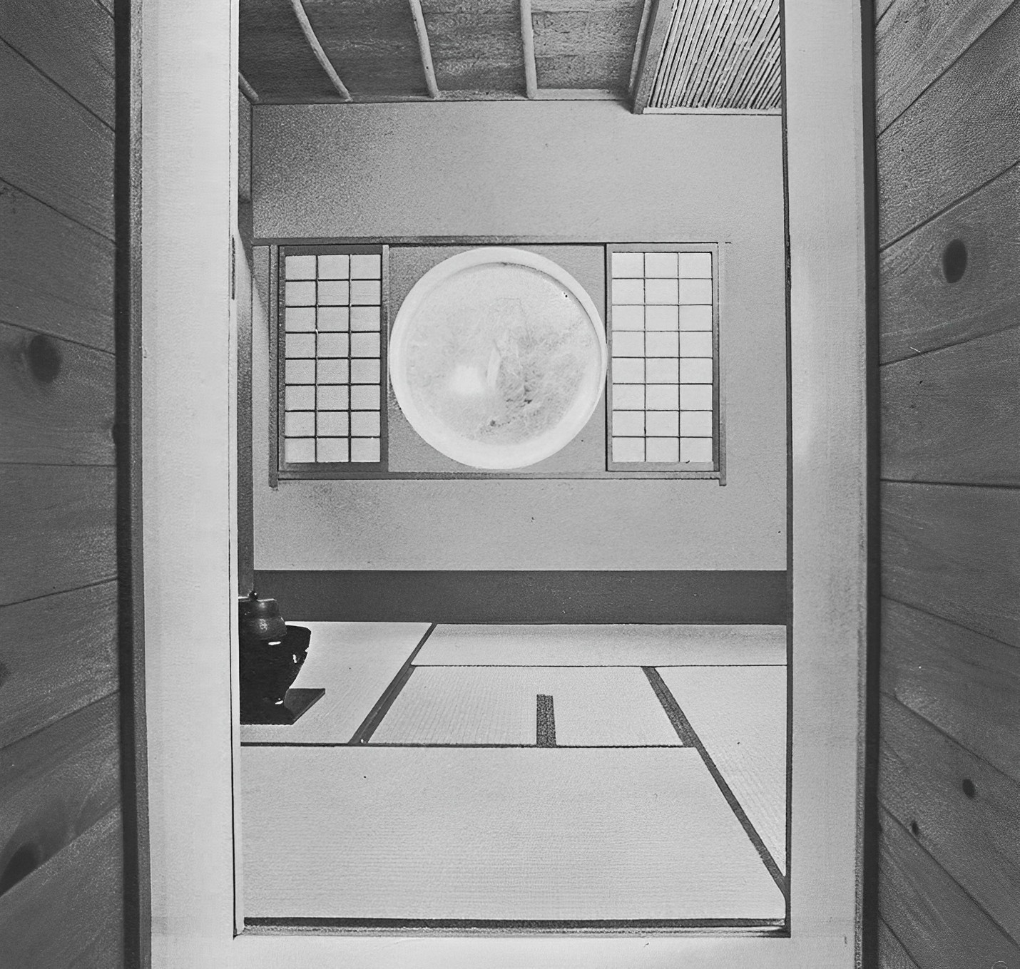 (7) Capsule House 'K'. Kurokawa’s summer house at Karuisawa, 1972, is a steel capsule on the outside with imitation wooden beams on the inside. The interior here is a traditional tea ceremony room with 4½ tatami mats and shoji, sliding translucent windows. The round windows, reminiscent of washing machines to us, crystallize both ancient and modern meanings, a good example of what Kurokawa calls ‘antagonistic coexistence’.